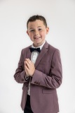 Relaxed studio portrait capturing Charlie's confidence, personality, and his beautiful smile.