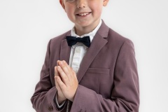 Relaxed studio portrait capturing Charlie's confidence, personality, and his beautiful smile.
