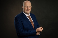 Relaxed, confident studio headshot of Ross, photographed in Meath near Dublin.