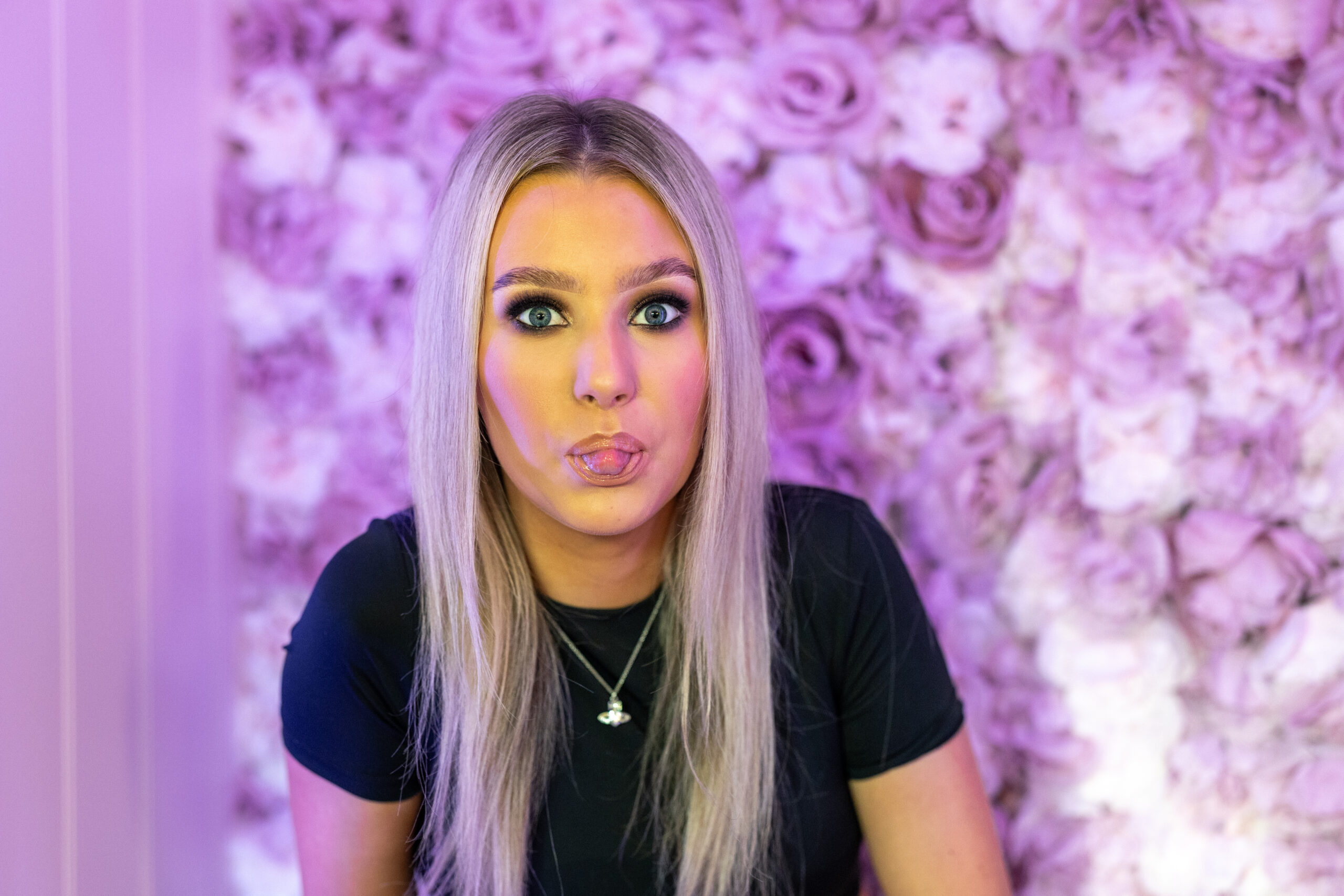 Cheeky but beautiful, fun headshot of Make-up Artist, Amy