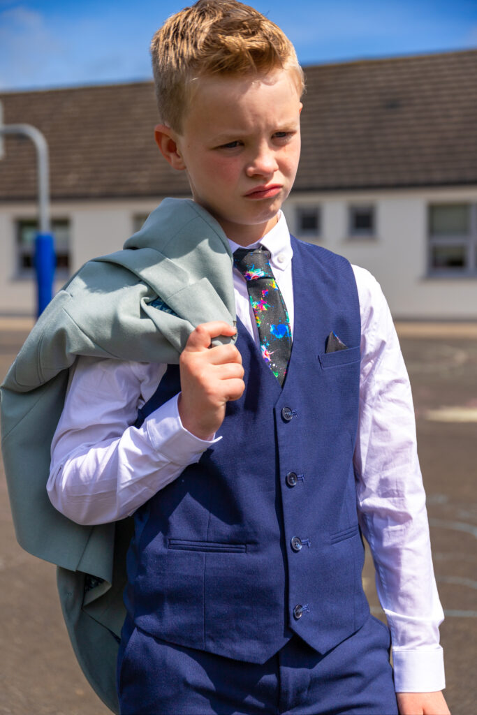 Boys First Communion photoshoot - Joshua poses in this photo after his first communion in County Meath. First communion photography by Shabyphotography at www.shaby.ie