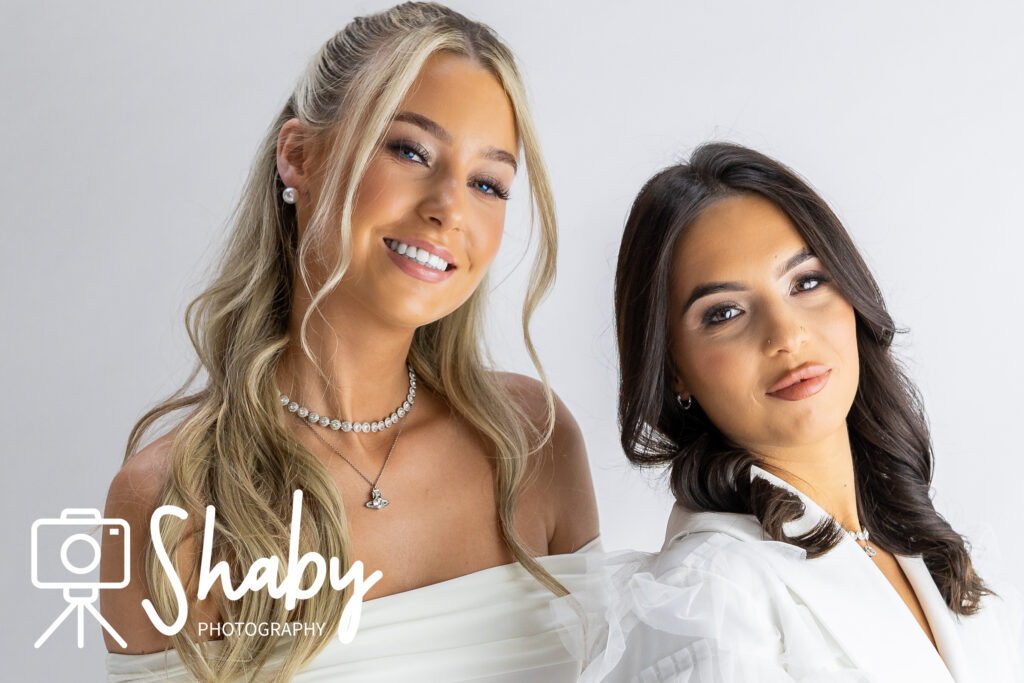 Portrait photography, with a Candid moment of laughter with Vanesa and Amy in the studio during the 20th birthday photoshoot