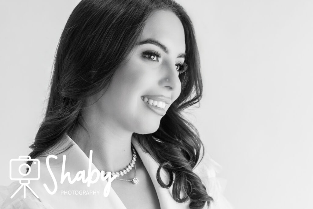 Elegant black and white portrait of Vanesa celebrating her 20th birthday in the studio