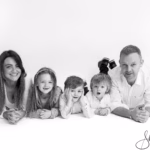 Photographers studio in Meath, just 30 minutes outside of Dublin - beautiful playful family portrait in black and white