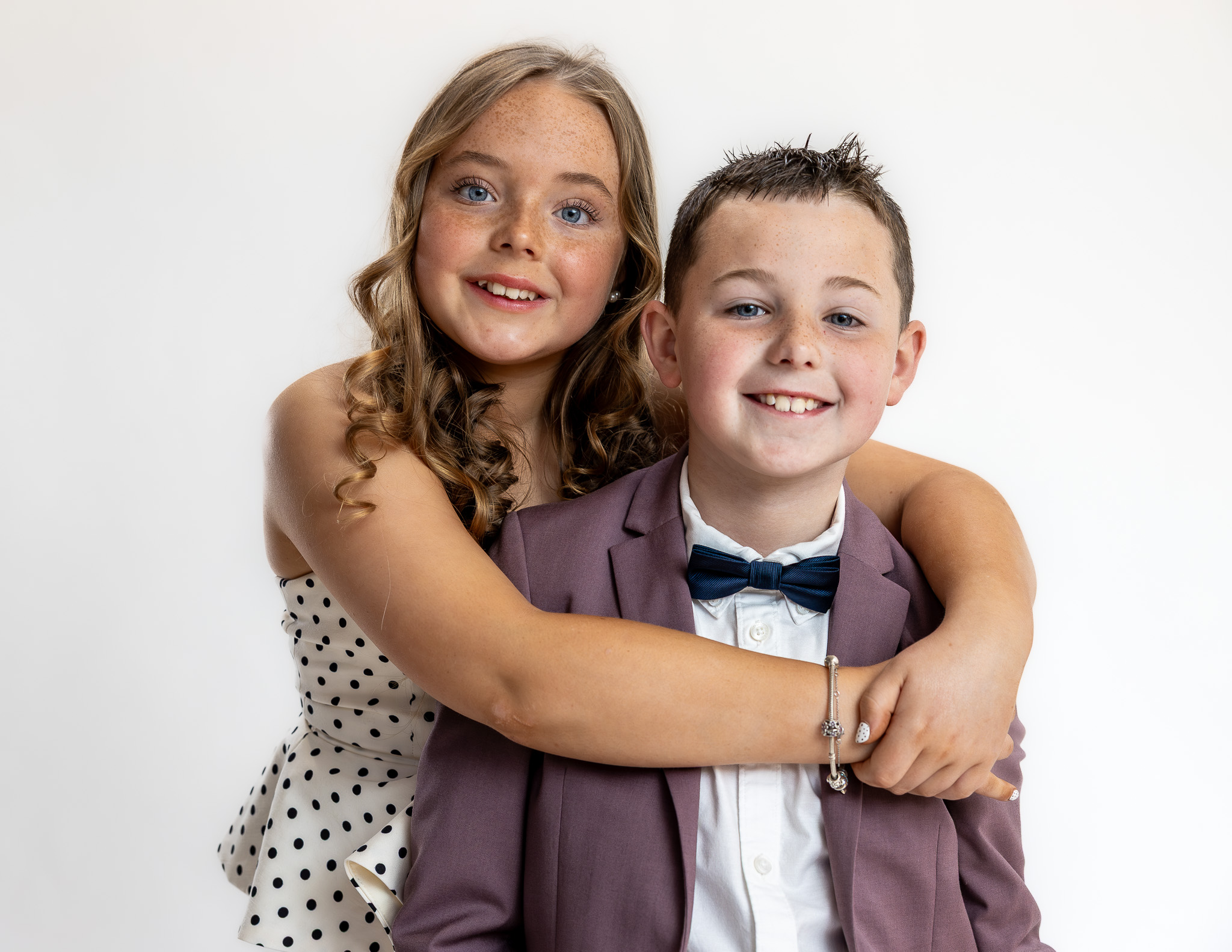 Relaxed sibling portrait with Charlie and his cousin during a natural family photography session in Ireland.