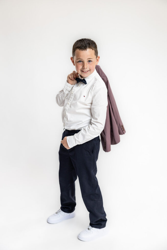 Modern studio portrait of Charlie smiling during a relaxed family photography session near Dublin.