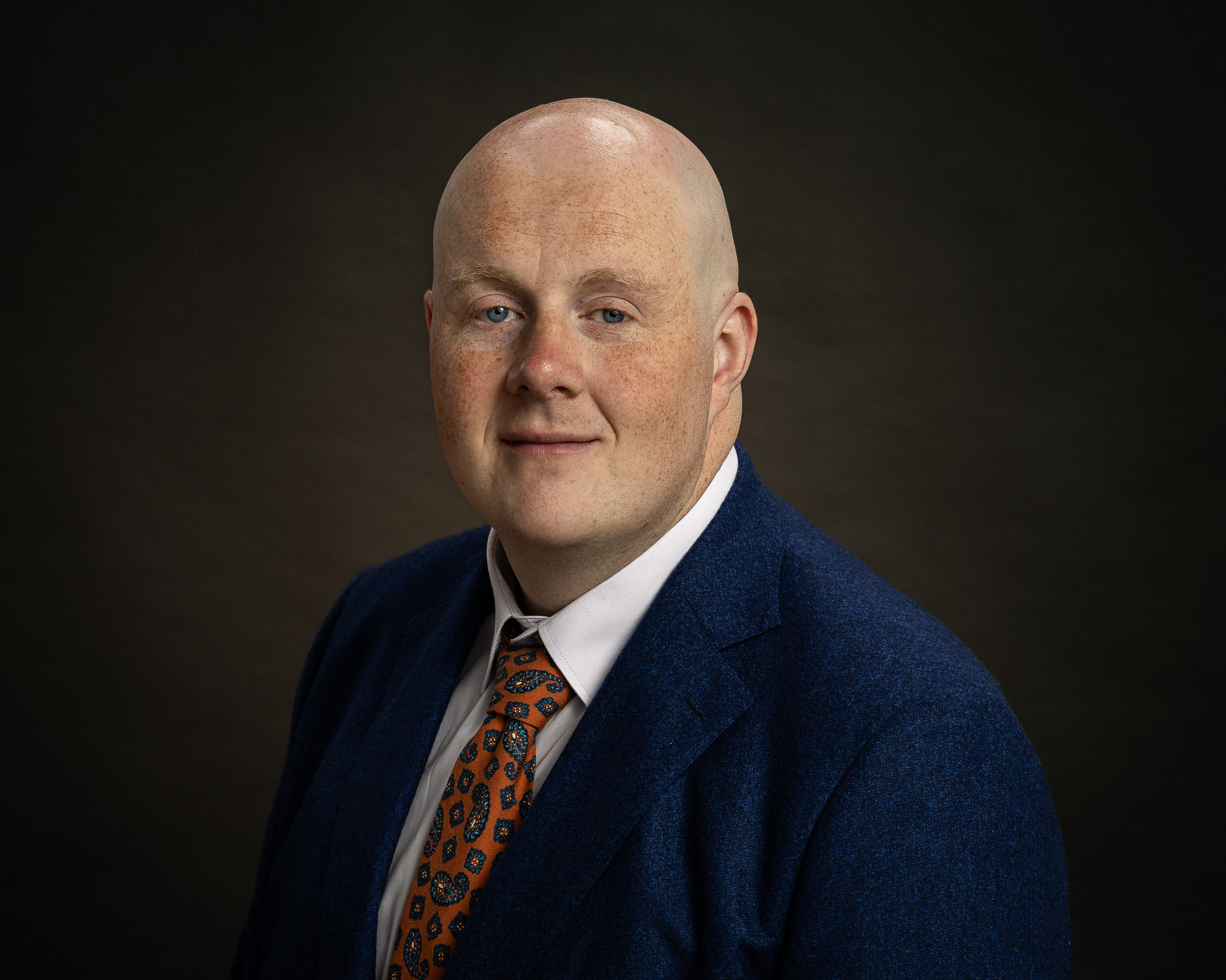 Natural professional headshot of Ross photographed in a studio near Dublin